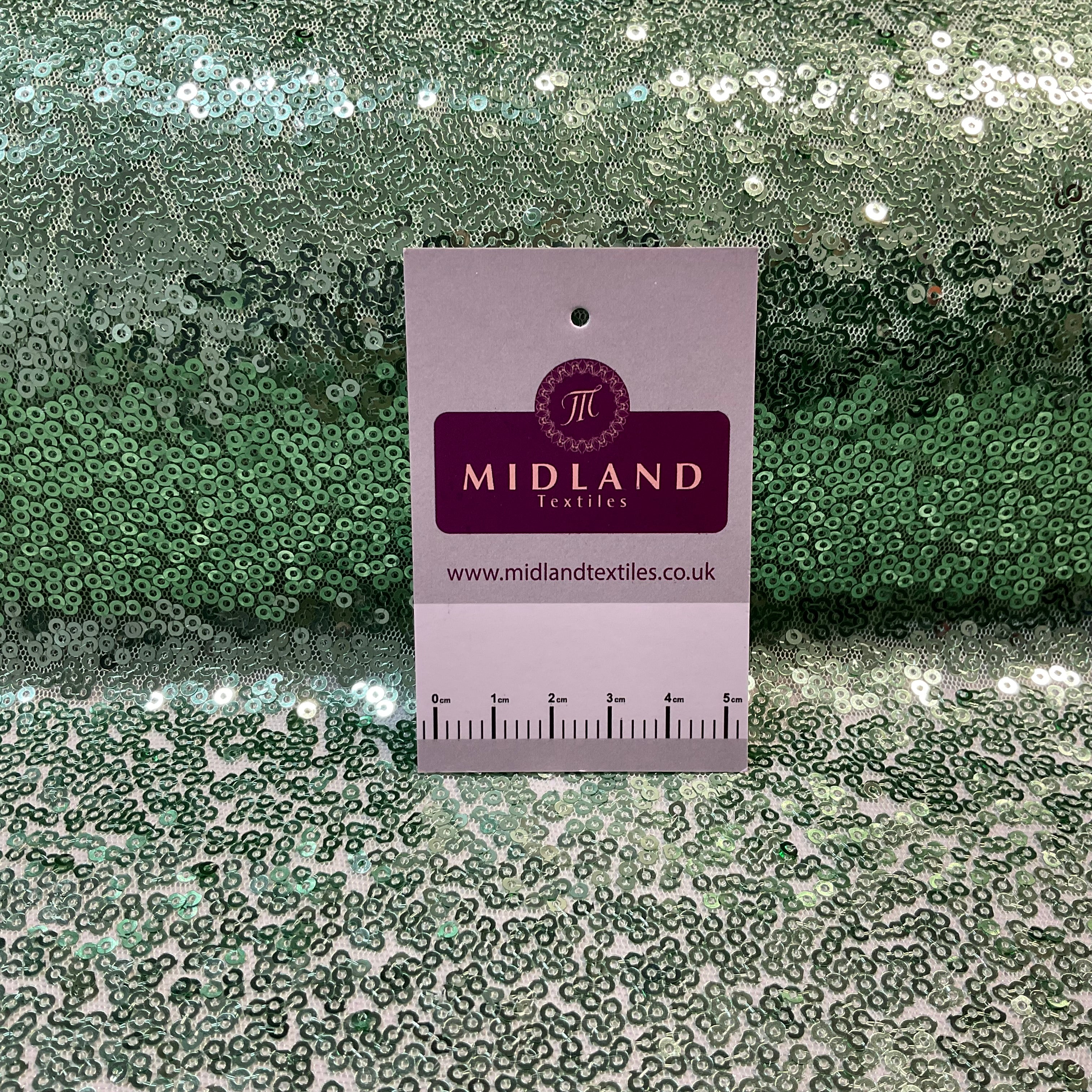 SENSATIONAL 3MM SEW ON ALL OVER SEQUINS ON NET FABRIC 50