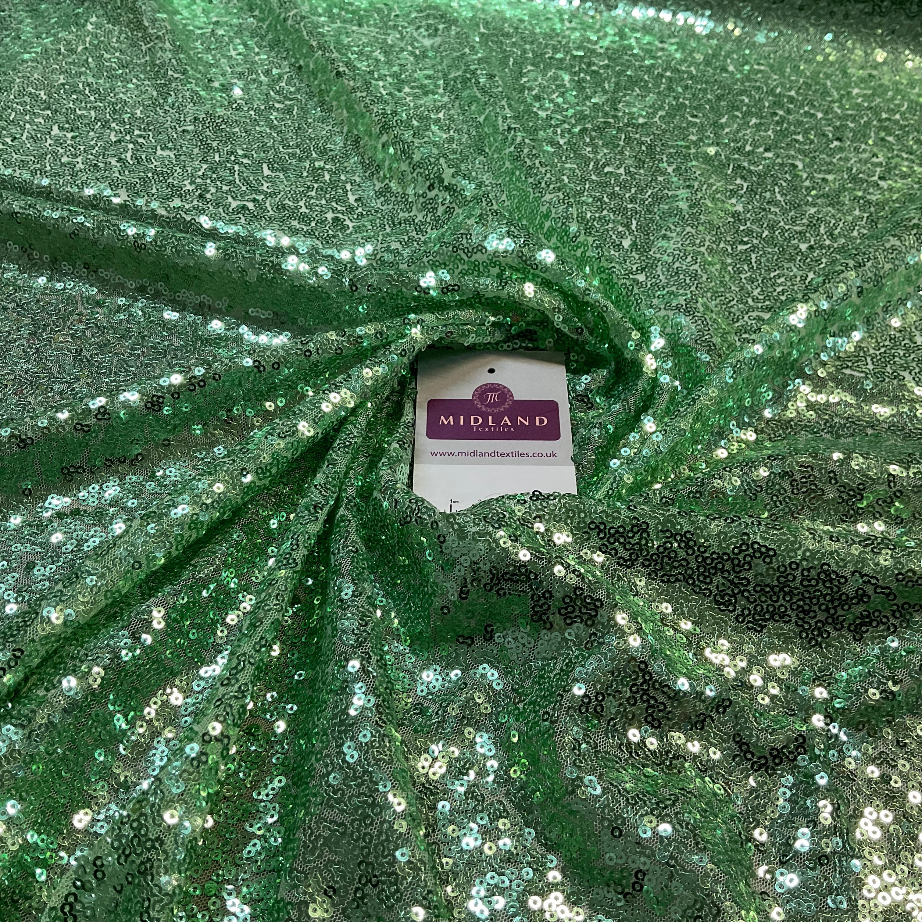 SENSATIONAL 3MM SEW ON ALL OVER SEQUINS ON NET FABRIC 50' WIDE DRESS FABRIC M1797 MTEX