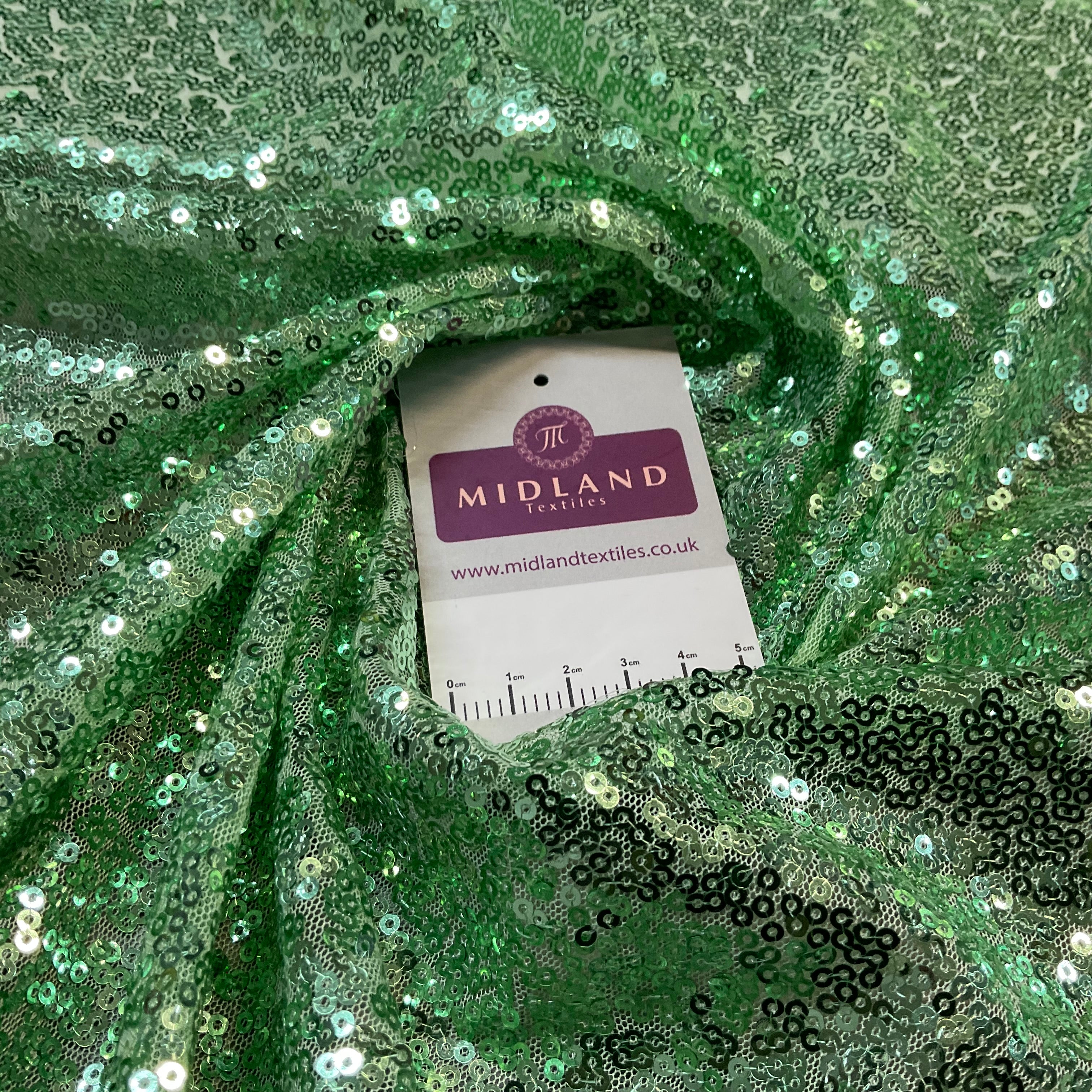 SENSATIONAL 3MM SEW ON ALL OVER SEQUINS ON NET FABRIC 50