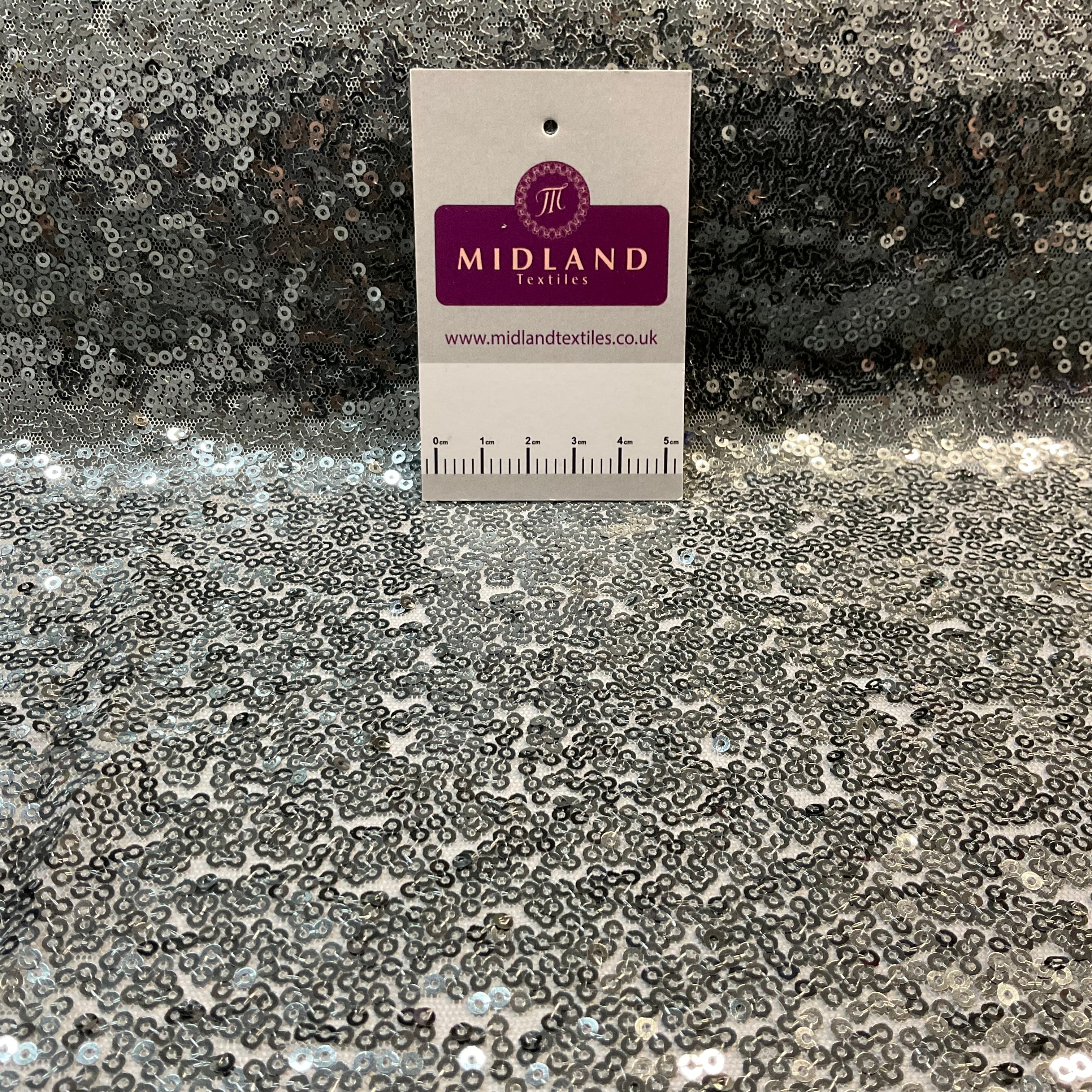 SENSATIONAL 3MM SEW ON ALL OVER SEQUINS ON NET FABRIC 50