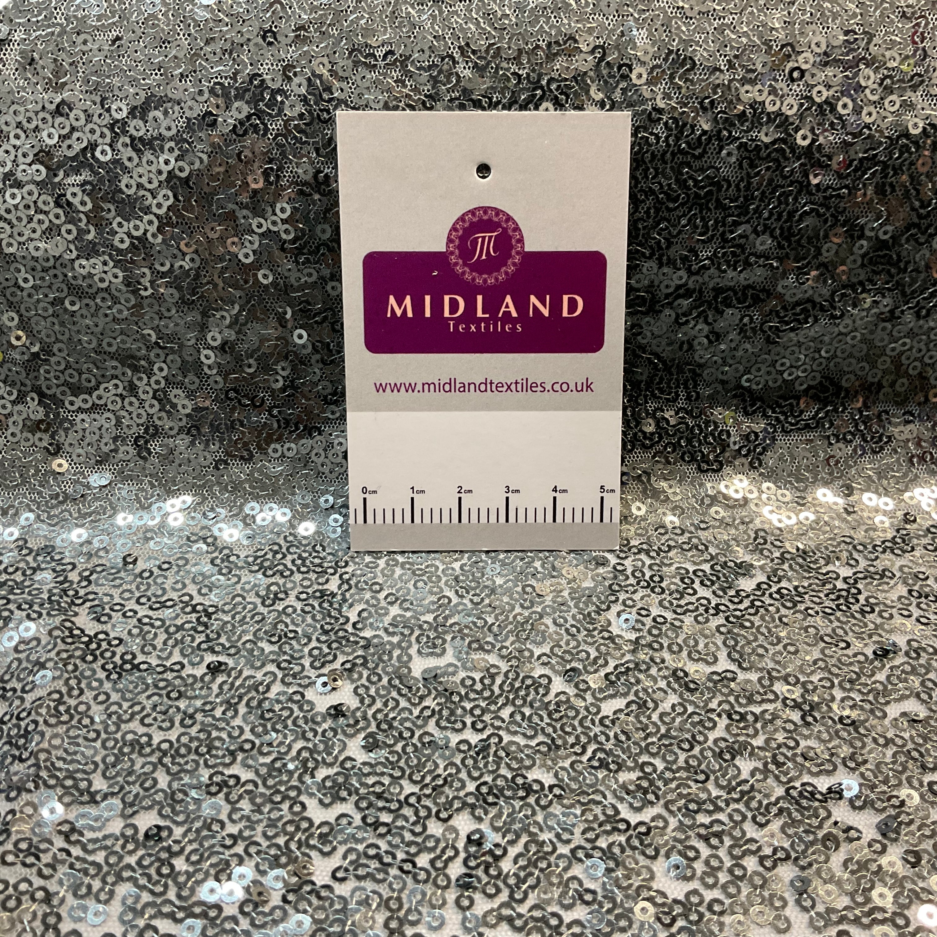 SENSATIONAL 3MM SEW ON ALL OVER SEQUINS ON NET FABRIC 50