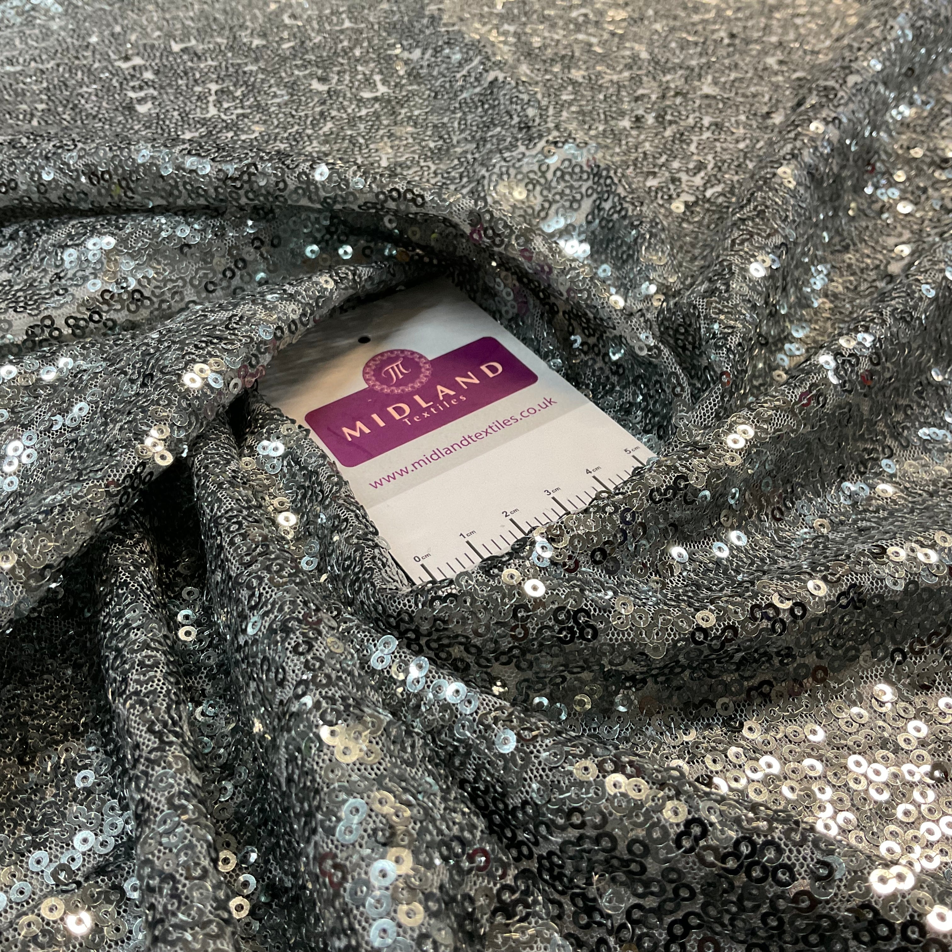 SENSATIONAL 3MM SEW ON ALL OVER SEQUINS ON NET FABRIC 50' WIDE DRESS FABRIC M1797 MTEX