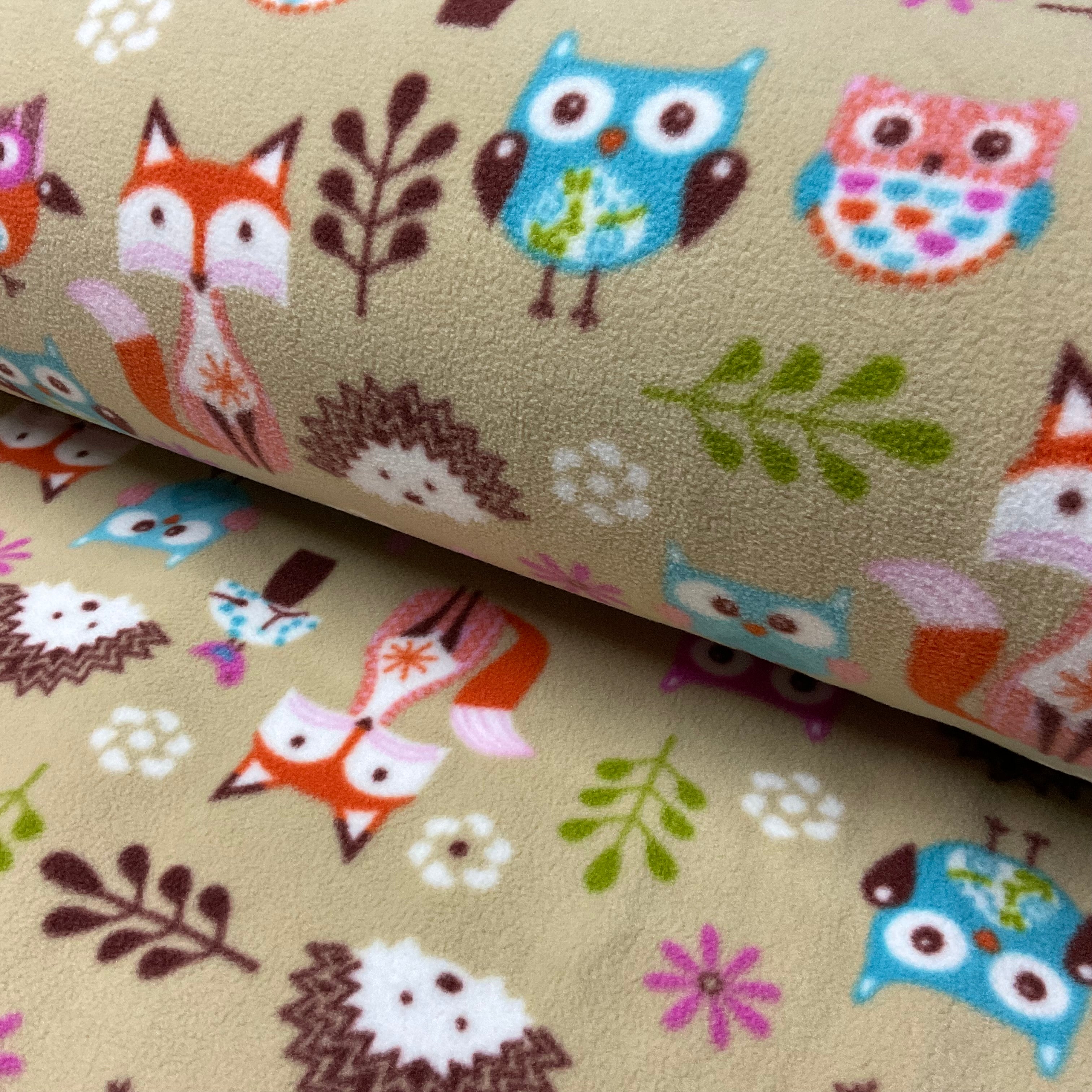 Beige Woodland animal printed anti pil fleece ideal for Blankets & throws fabric 150cm wide M2067-1