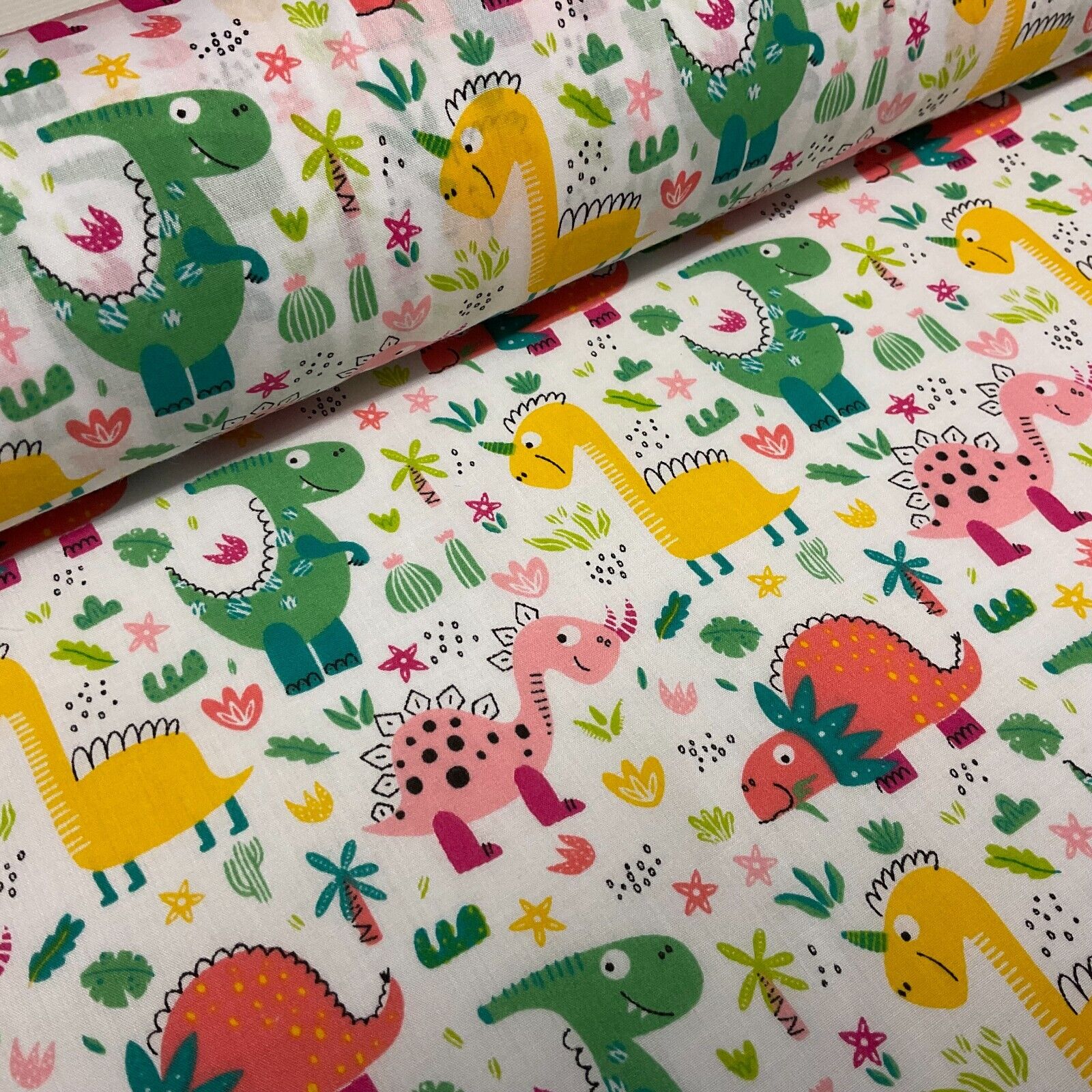 White Colourful Dinosaurs Children Poly cotton printed lightweight fabric M1642