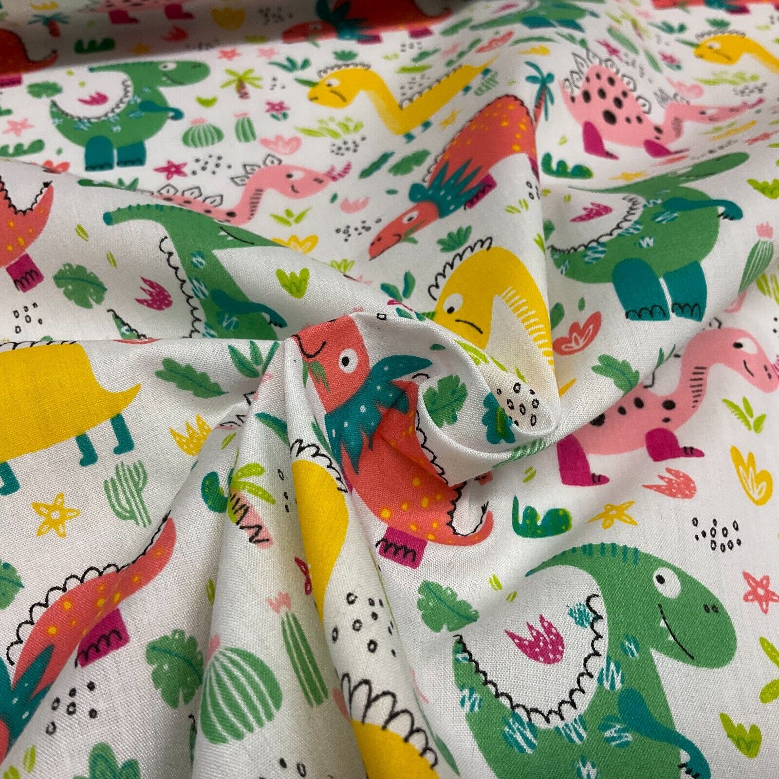 White Colourful Dinosaurs Children Poly cotton printed lightweight fabric M1642