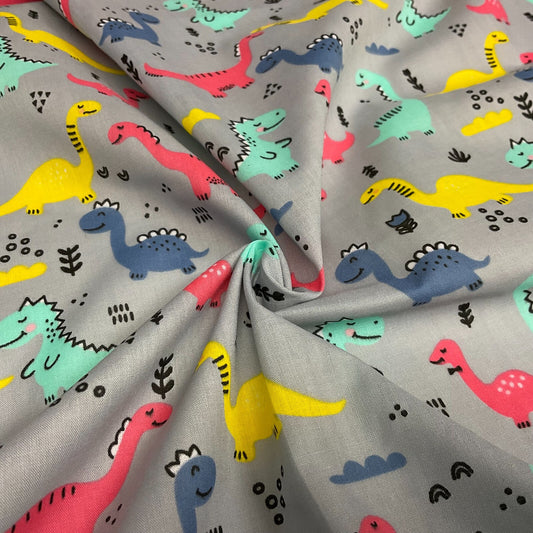 Colourful Dinosaurs Children's Poly cotton printed lightweight fabric M1644