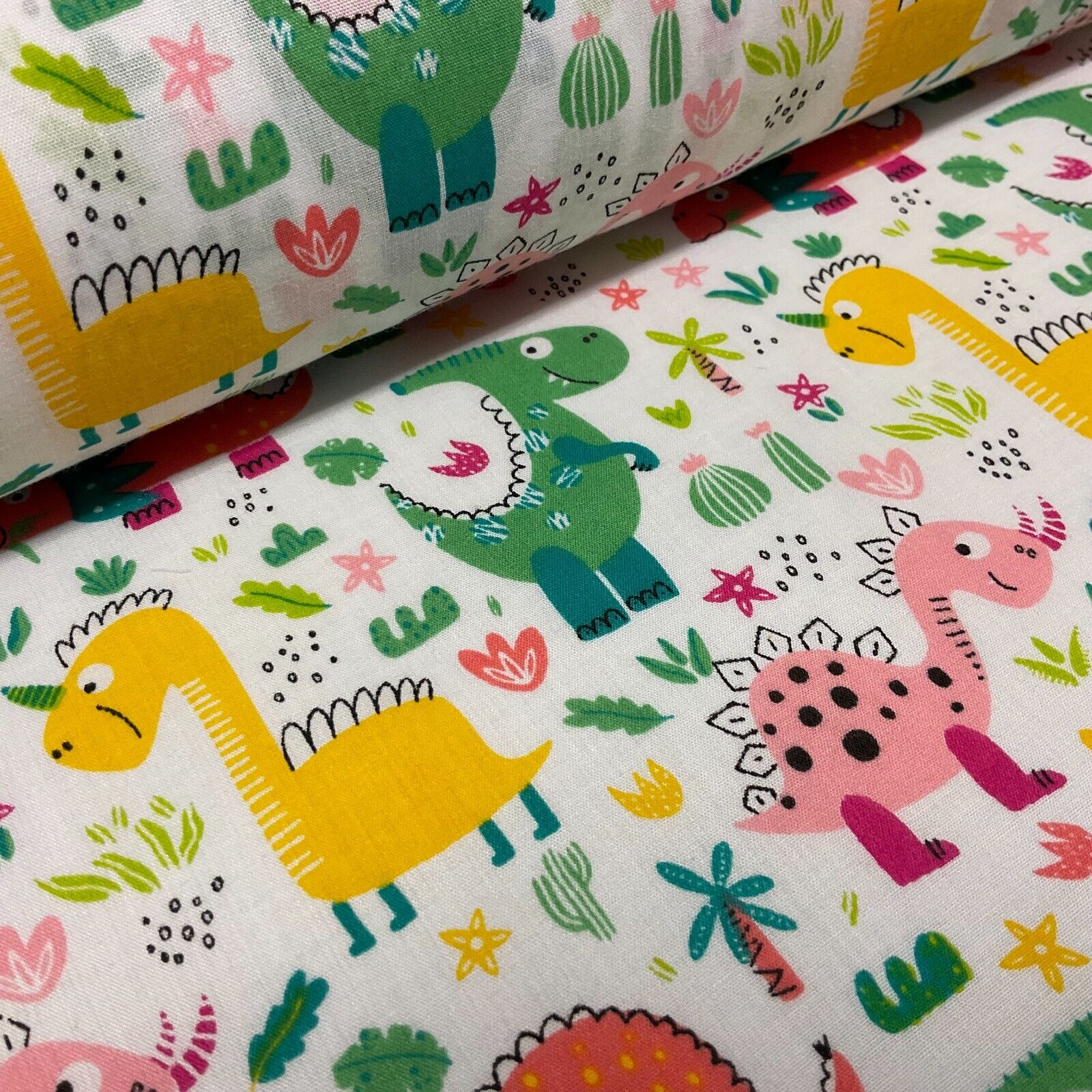 White Colourful Dinosaurs Children Poly cotton printed lightweight fabric M1642