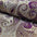 Close-up of purple and gold paisley patterned fabric