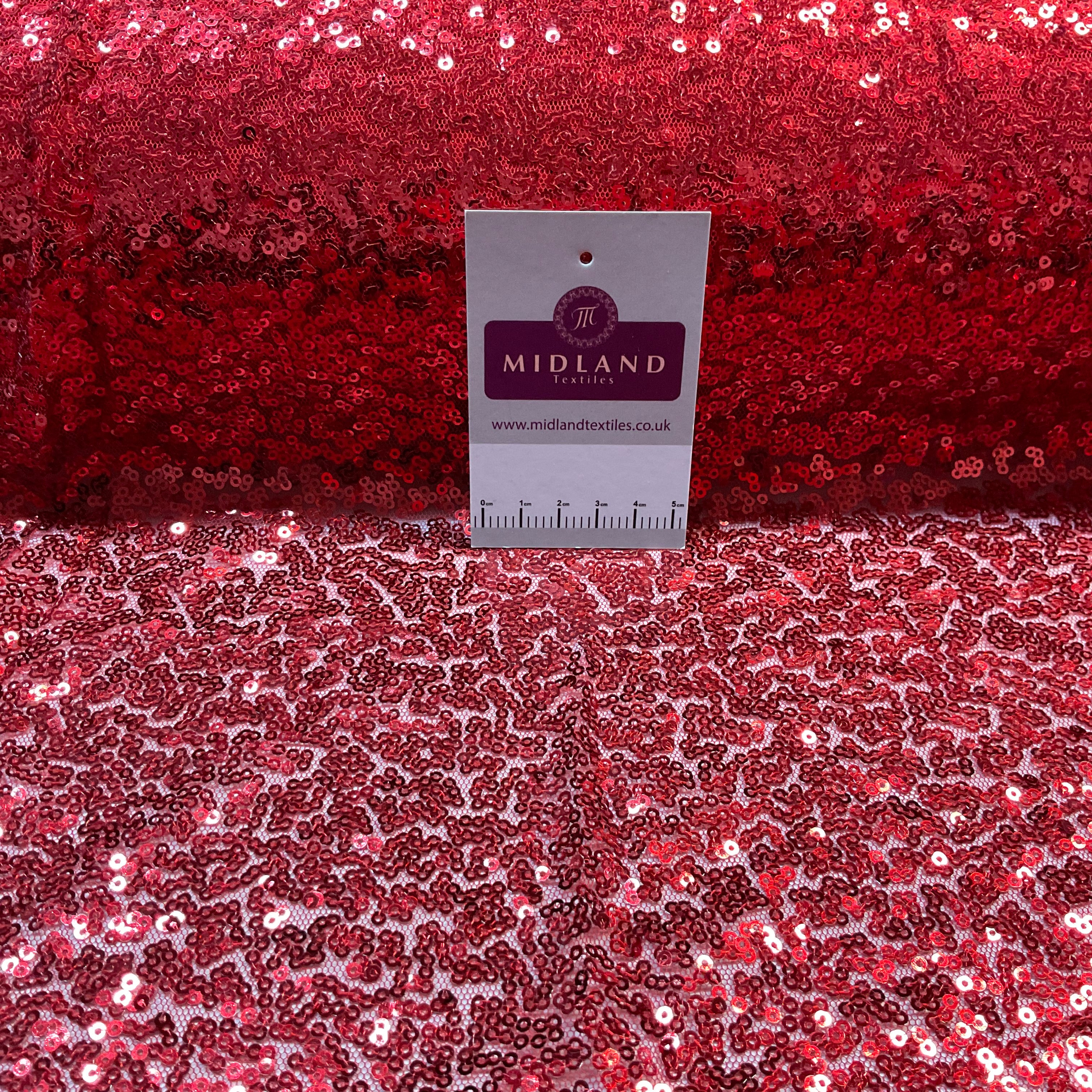 SENSATIONAL 3MM SEW ON ALL OVER SEQUINS ON NET FABRIC 50