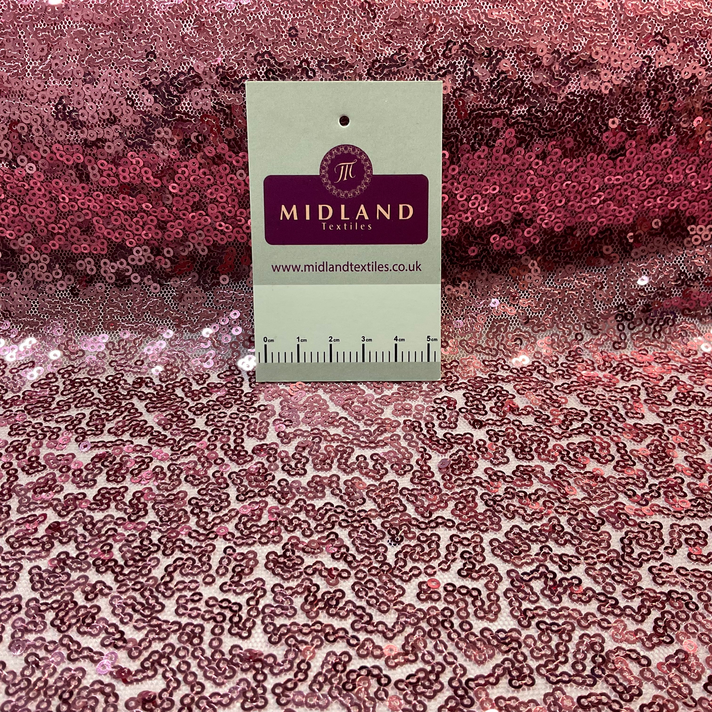 SENSATIONAL 3MM SEW ON ALL OVER SEQUINS ON NET FABRIC 50