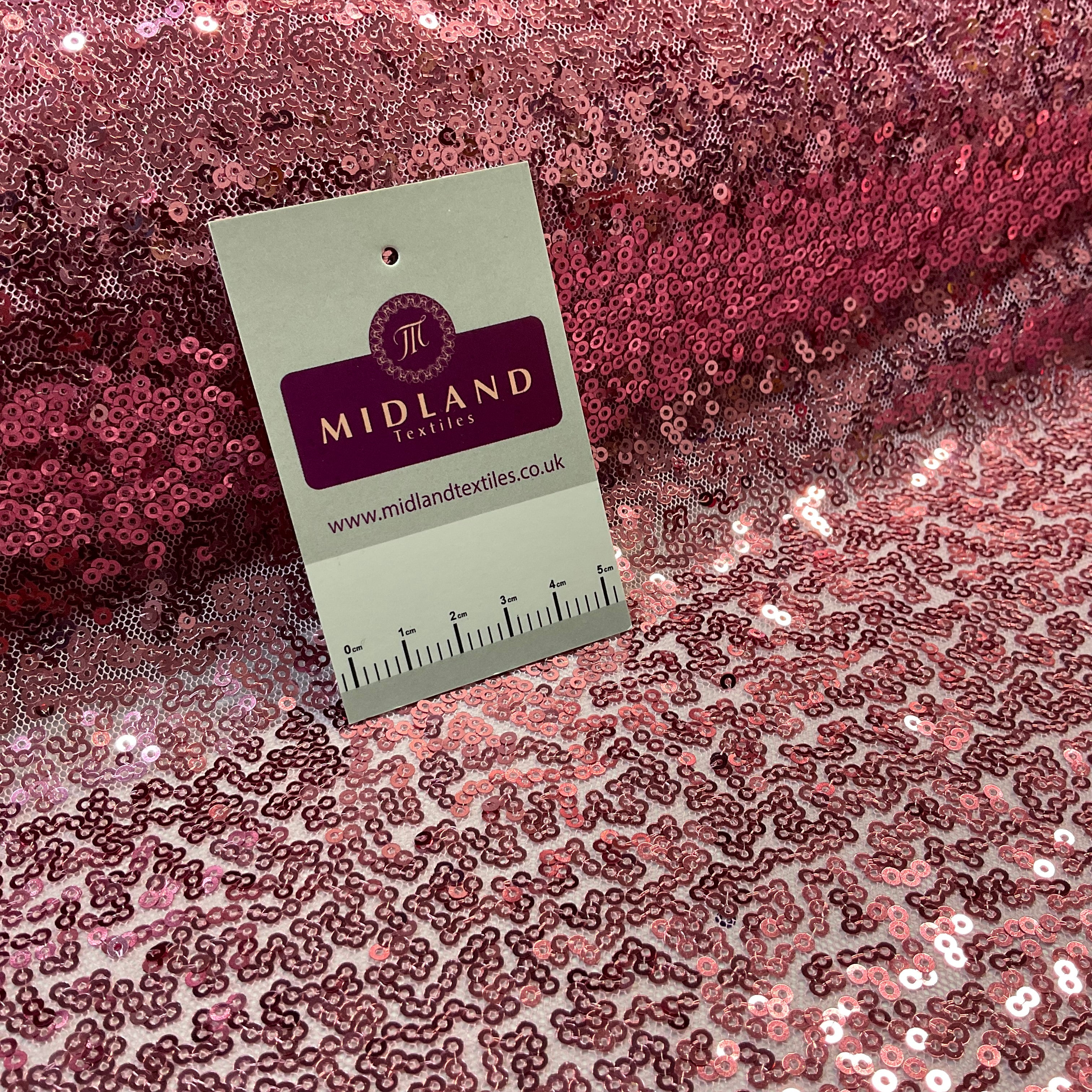 SENSATIONAL 3MM SEW ON ALL OVER SEQUINS ON NET FABRIC 50