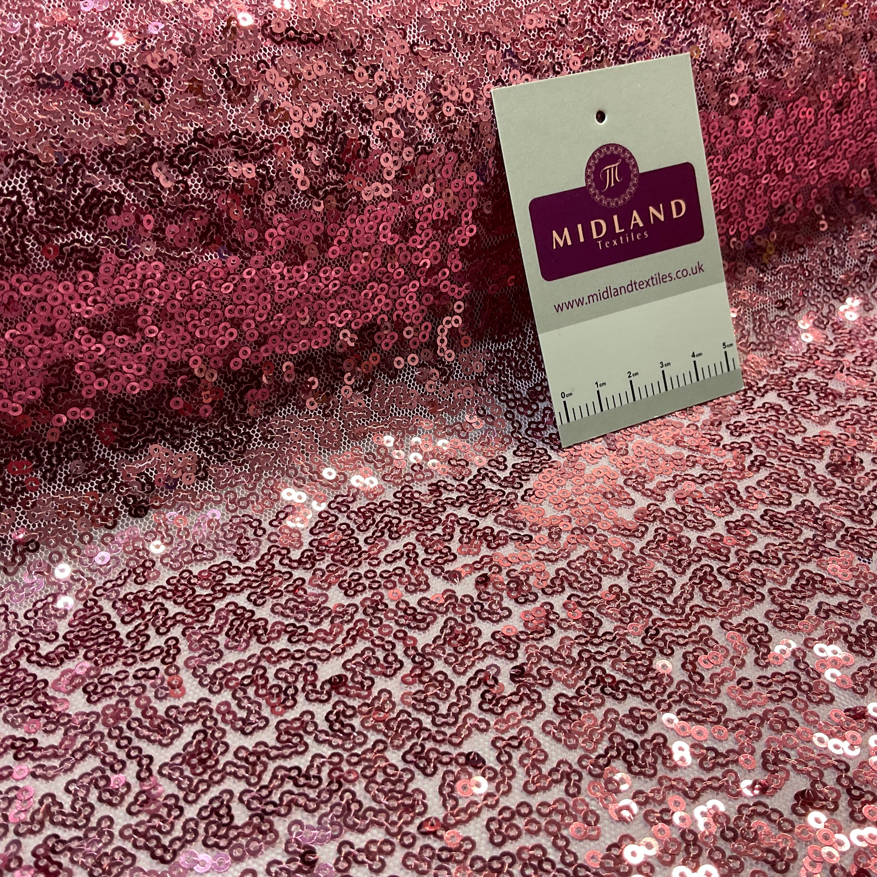 SENSATIONAL 3MM SEW ON ALL OVER SEQUINS ON NET FABRIC 50