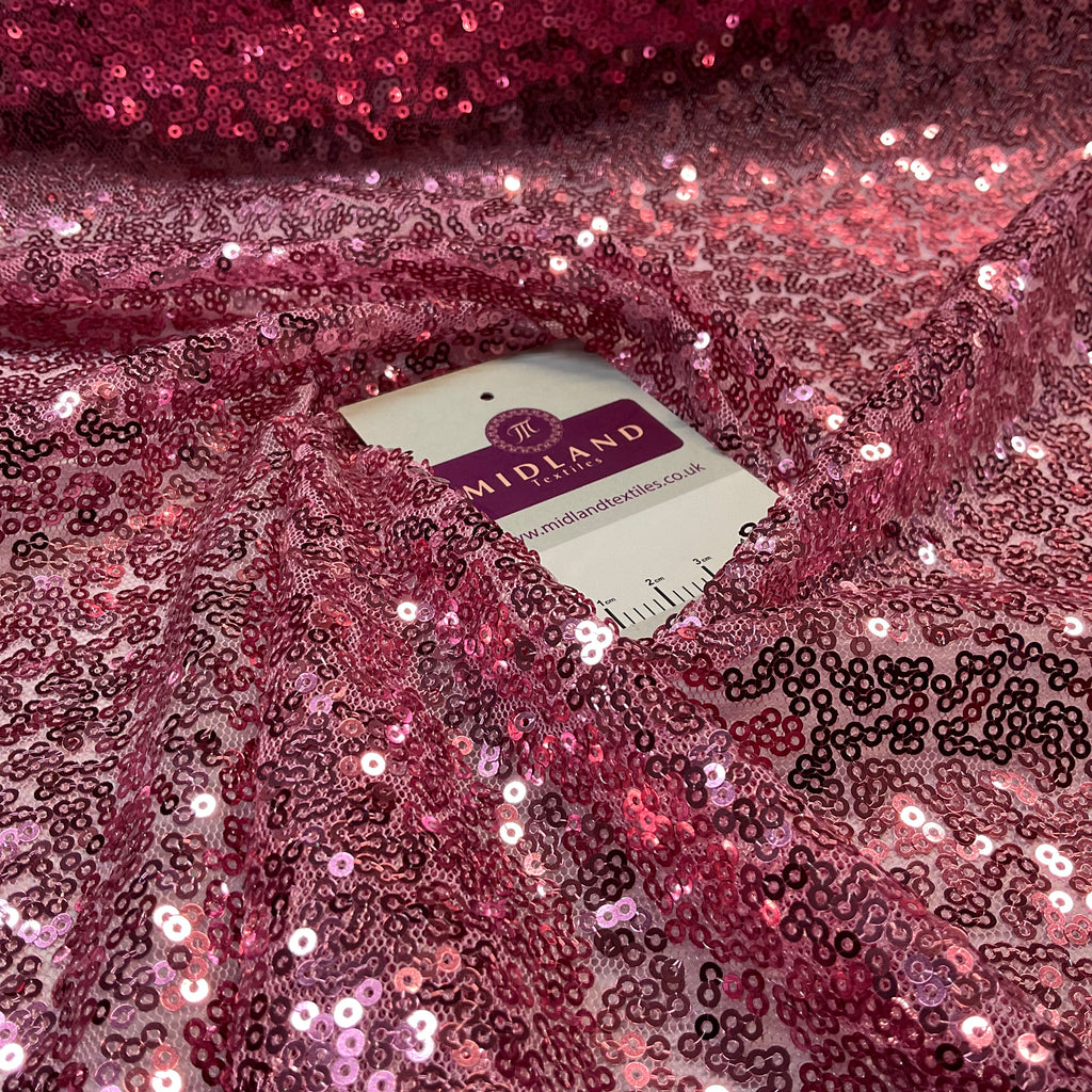 SENSATIONAL 3MM SEW ON ALL OVER SEQUINS ON NET FABRIC 50" WIDE DRESS FABRIC M1797 MTEX