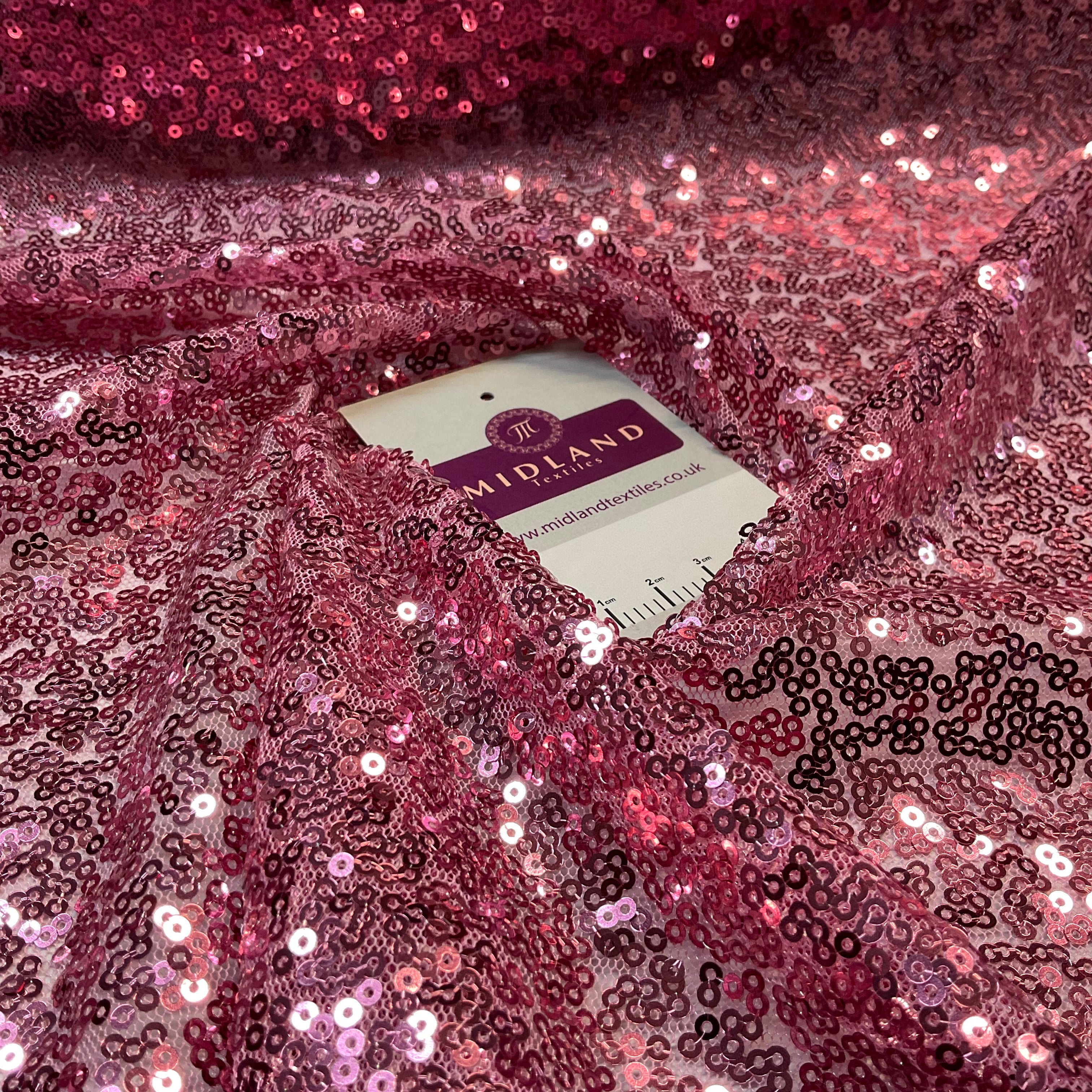 SENSATIONAL 3MM SEW ON ALL OVER SEQUINS ON NET FABRIC 50