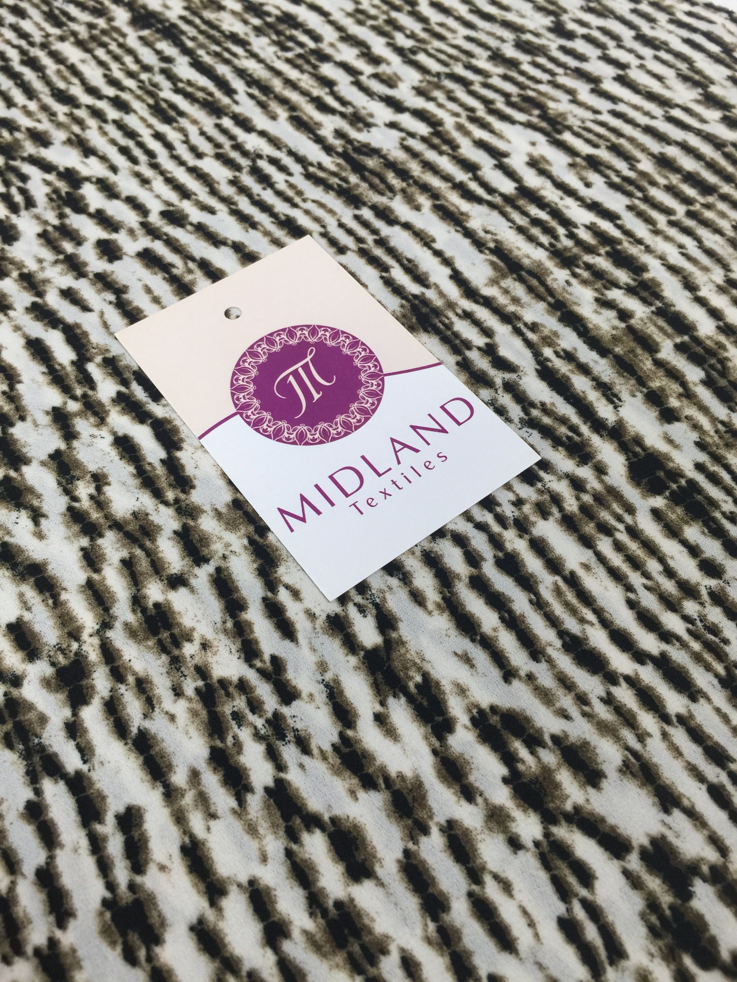 Black and Brown abstract print on cream Georgette  Dress fabric 58