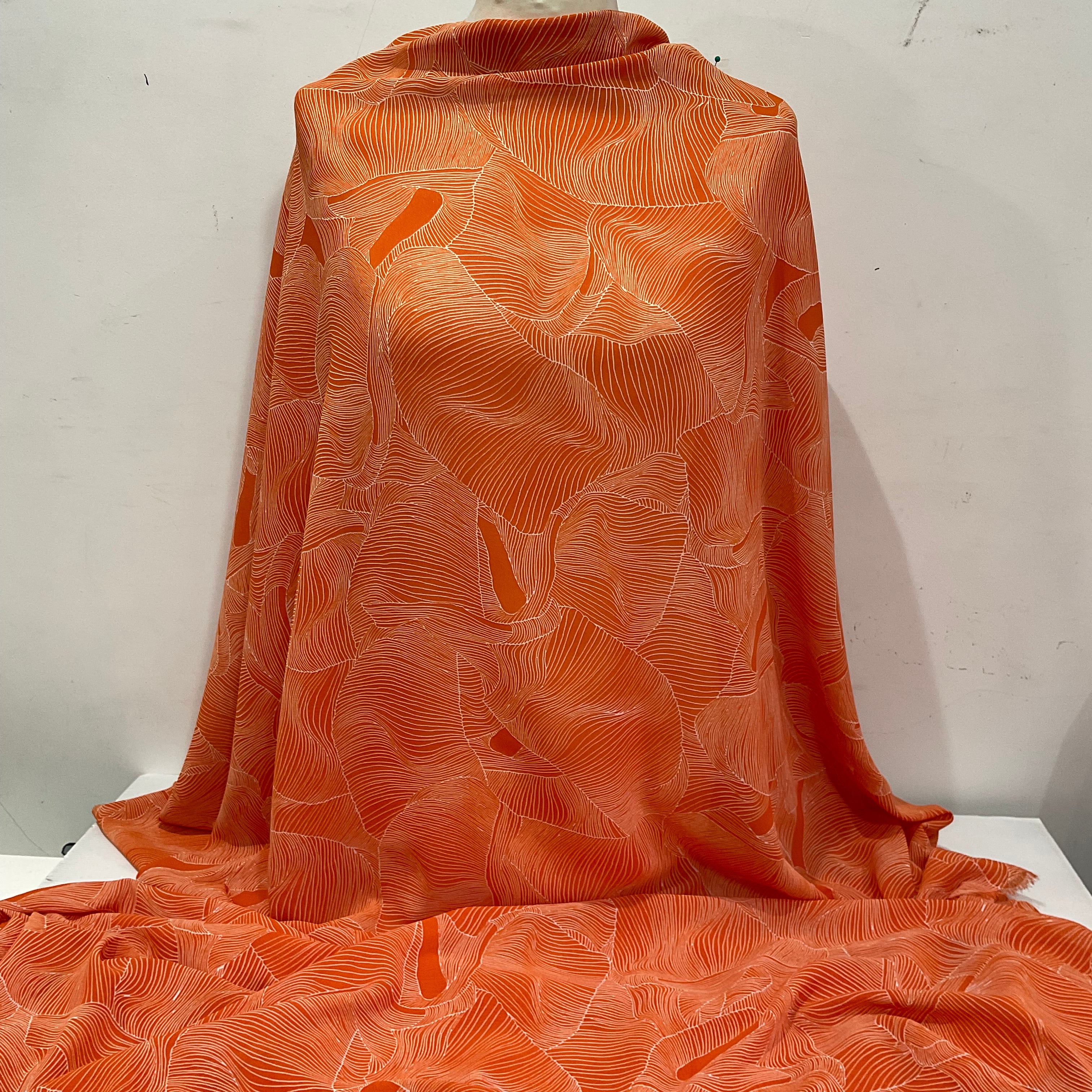 Orange and white pleat effect patterned dress fabric 58' M401-14 Mtex