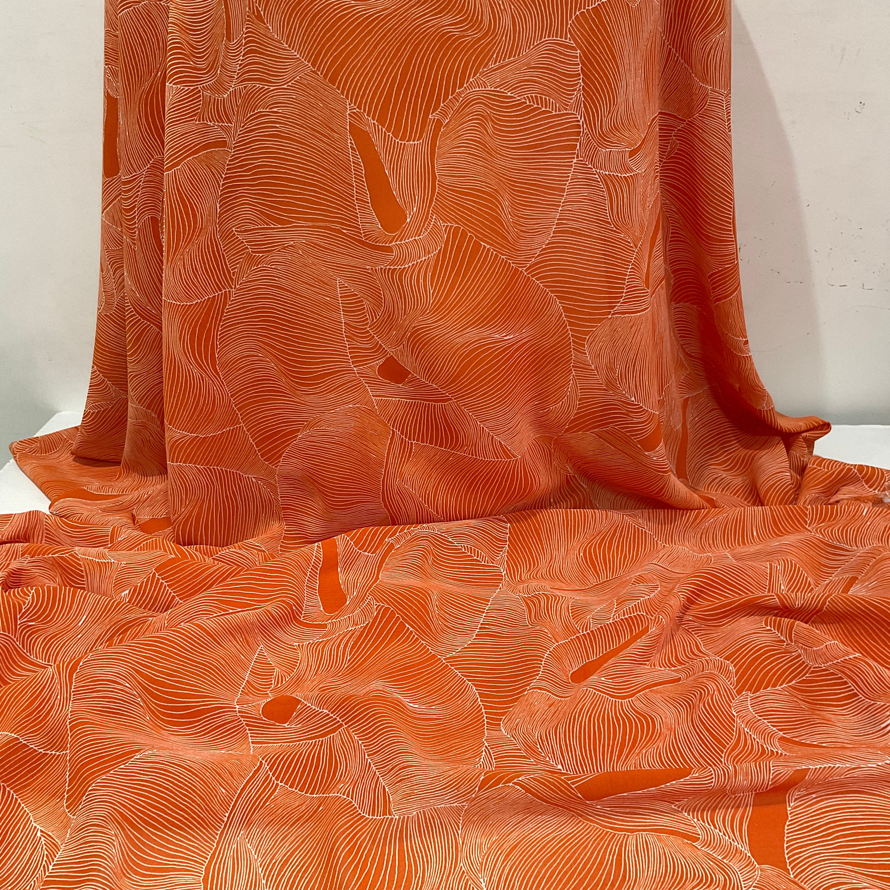 Orange and white pleat effect patterned dress fabric 58' M401-14 Mtex