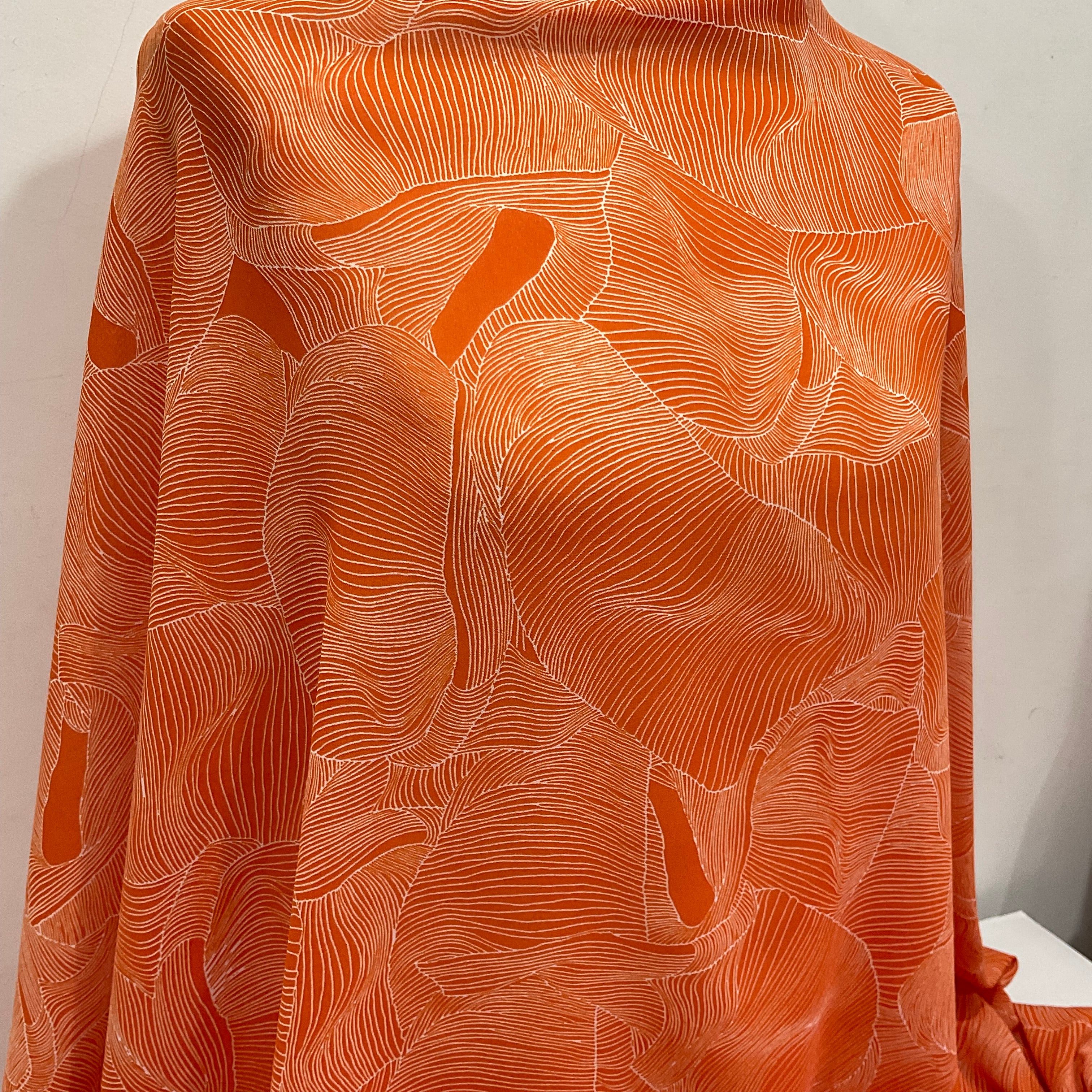 Orange and white pleat effect patterned dress fabric 58' M401-14 Mtex