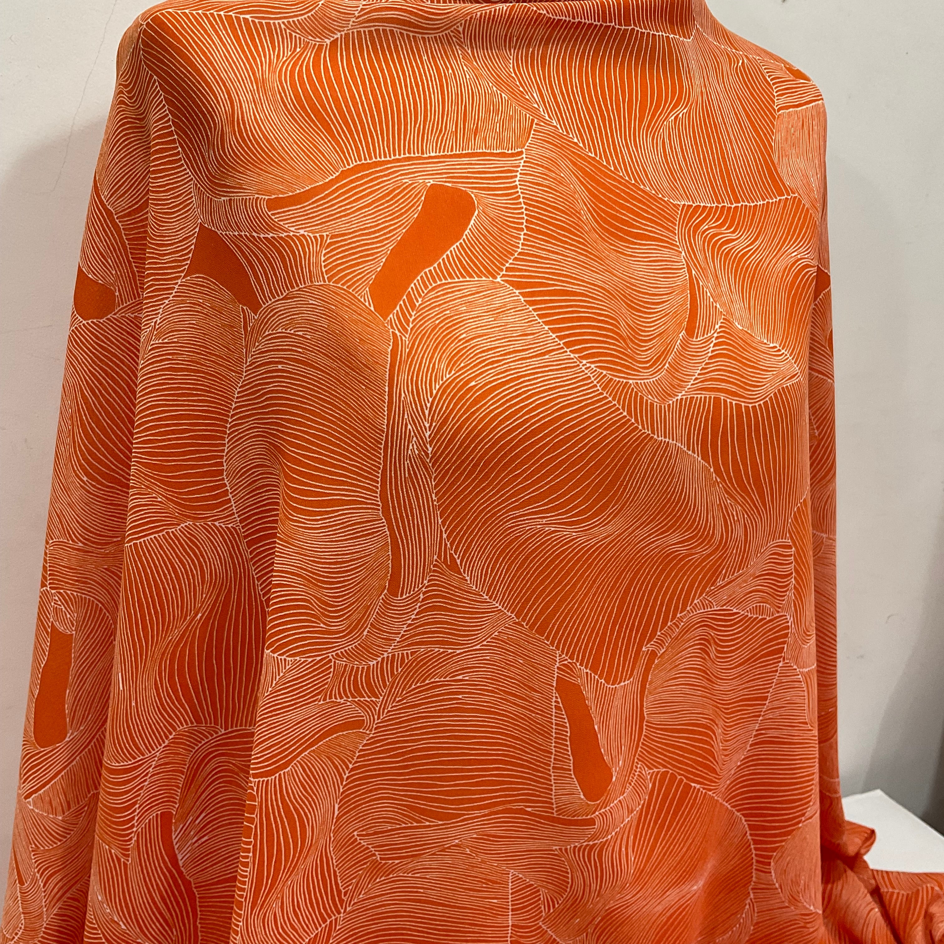 Orange and white pleat effect patterned dress fabric 58' M401-14 Mtex