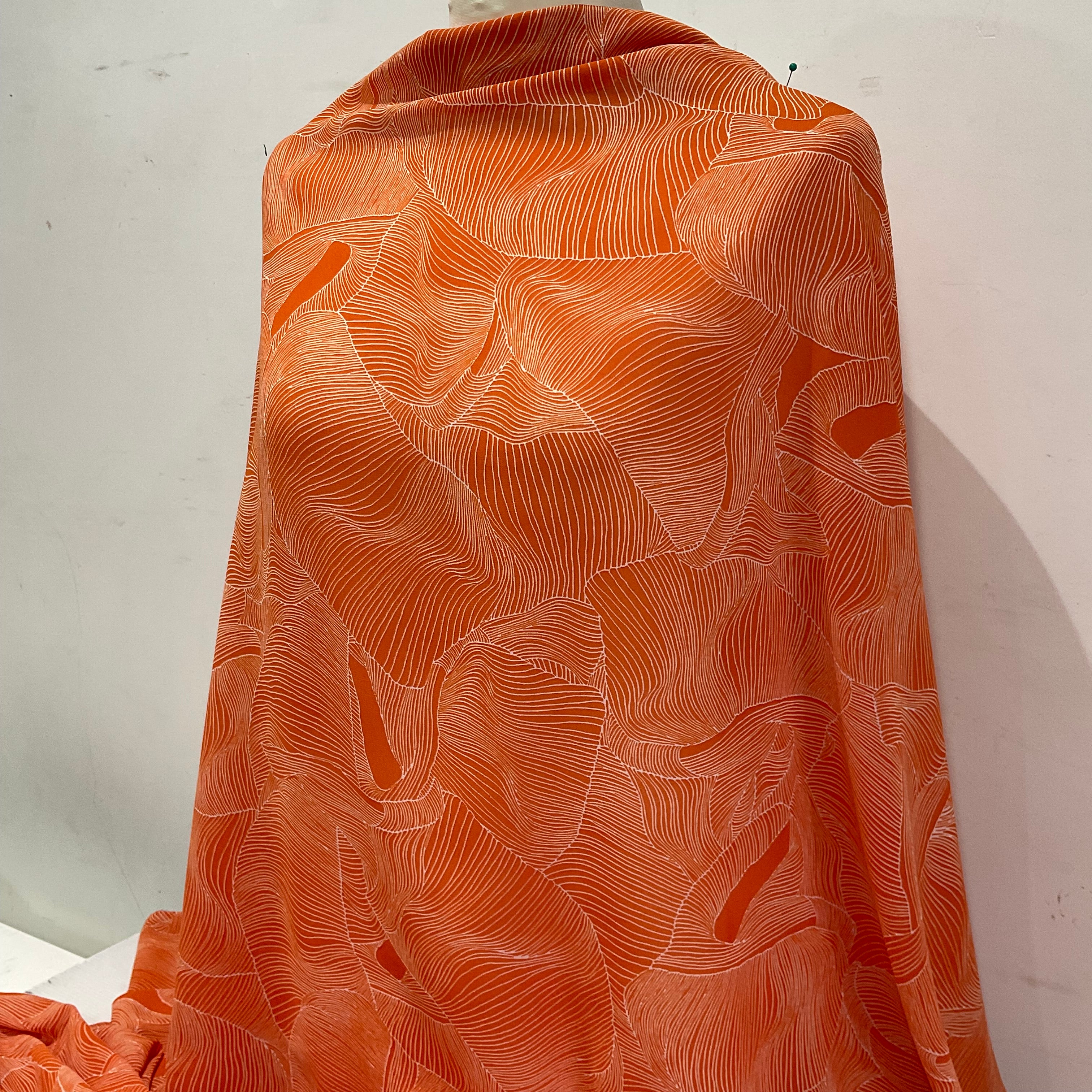 Orange and white pleat effect patterned dress fabric 58' M401-14 Mtex