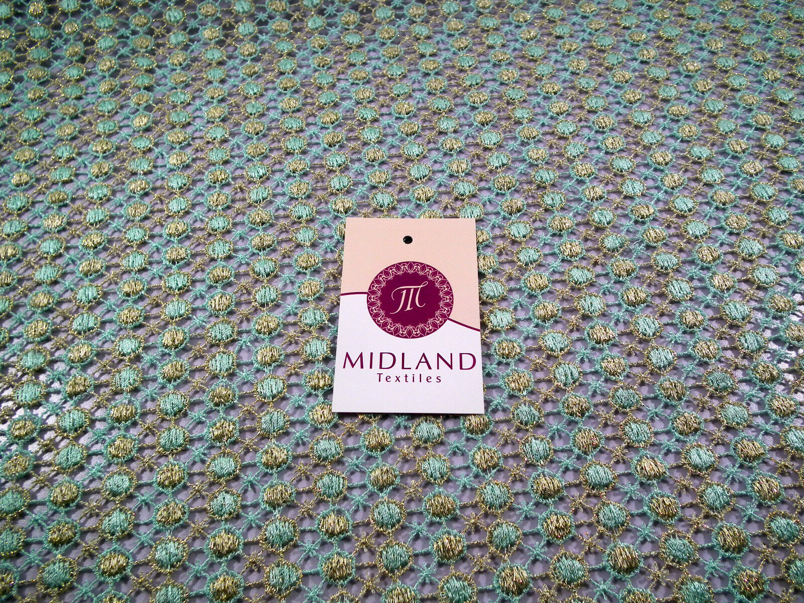 Fancy Guipure Net Lace fabric with metallic circle detail  M186-10 Mtex