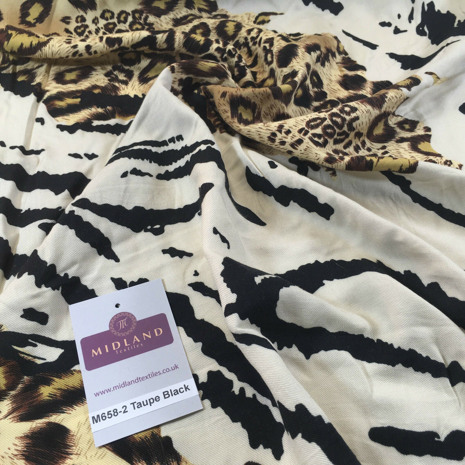 Diagonal mixed Animal theme Printed twill viscose dress fabric 58' wide M658