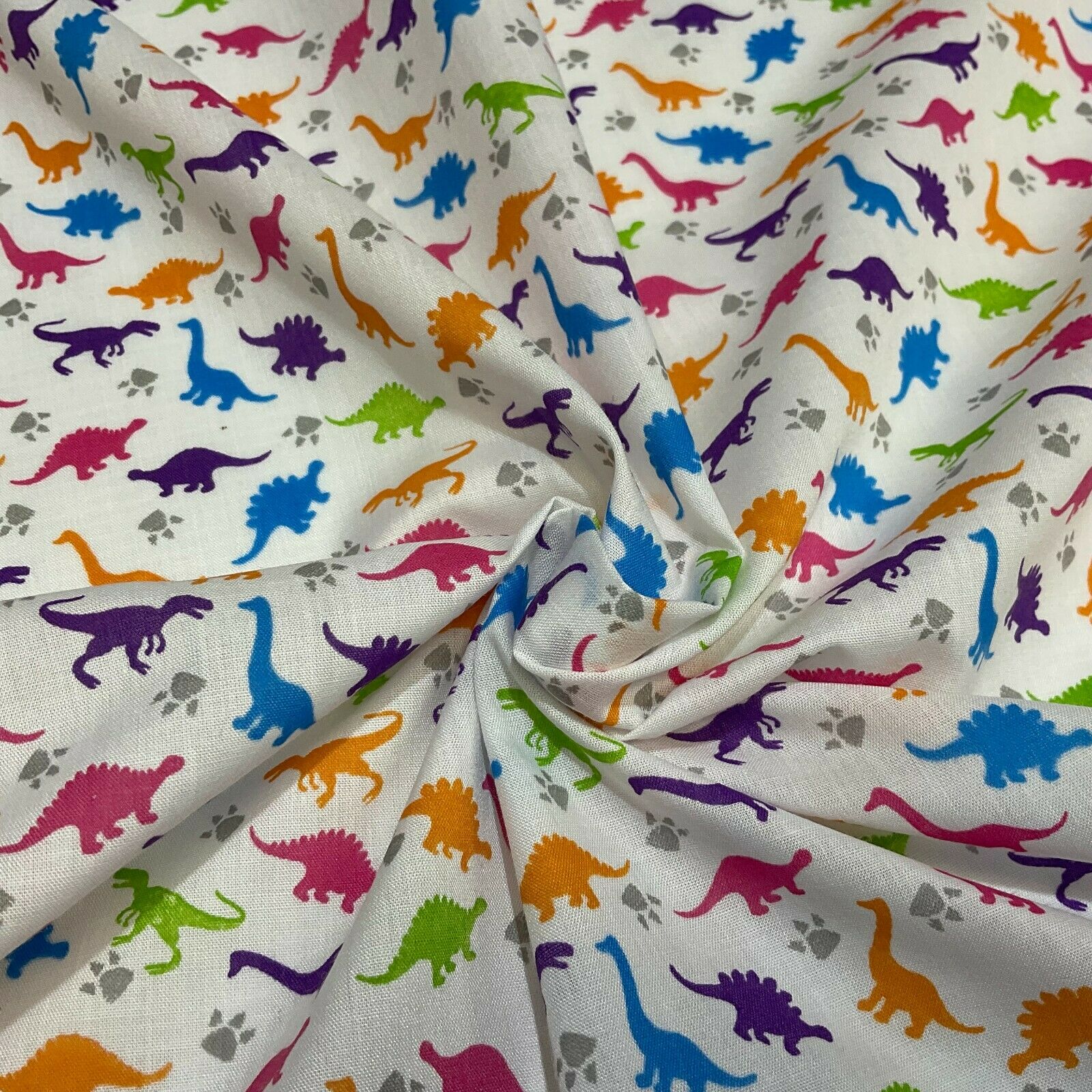 White Tiny Dinosaurs  Children's Poly cotton printed lightweight fabric M1637
