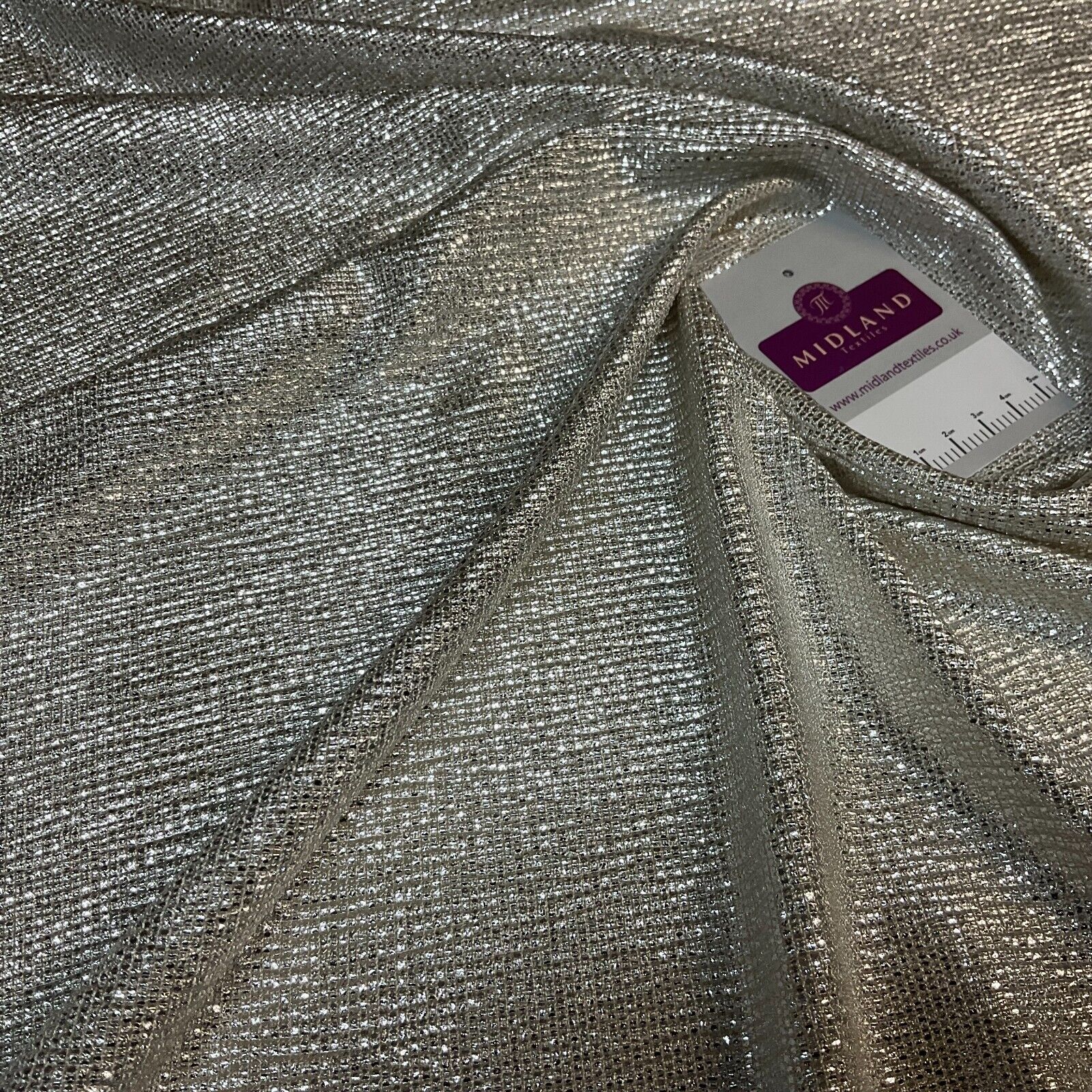 Jersey Foil Silver On Cream One way stretch Hologram Textured dress fabric M1740