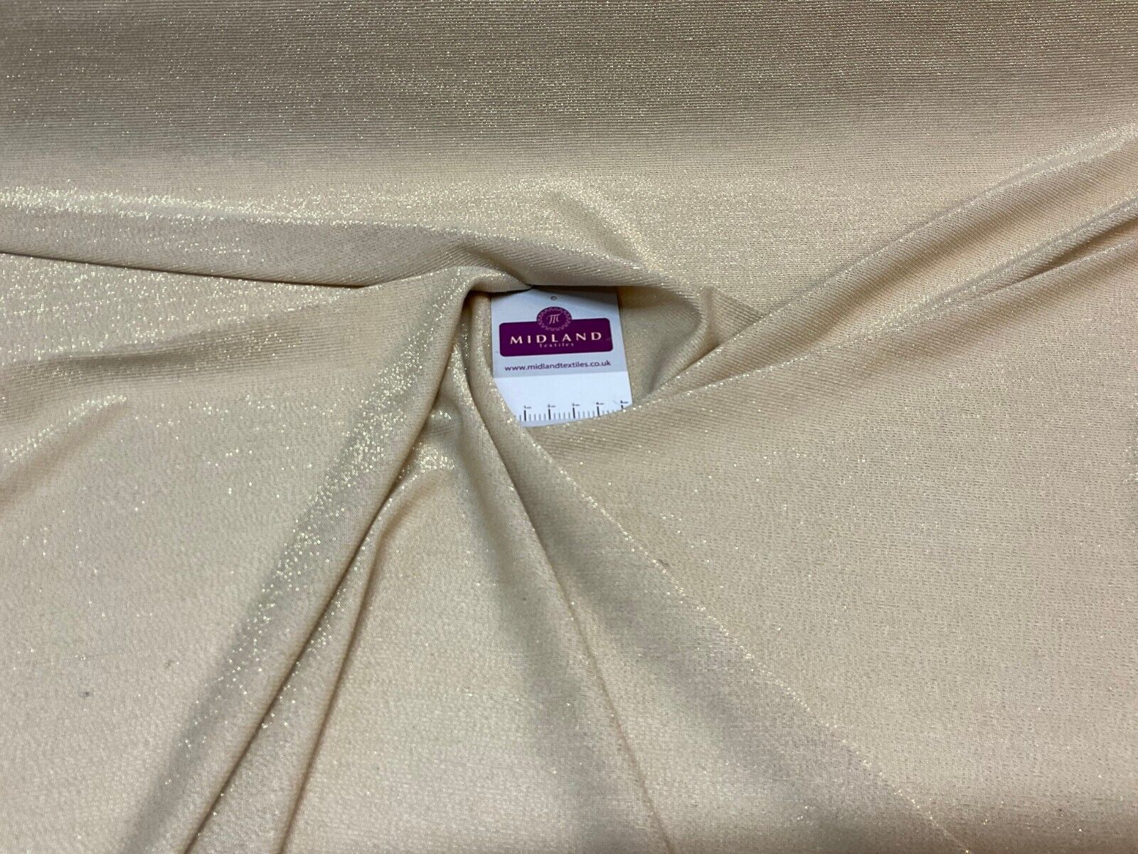 Gold Jersey Stretch Shimmer Metalic dress fabric M1783