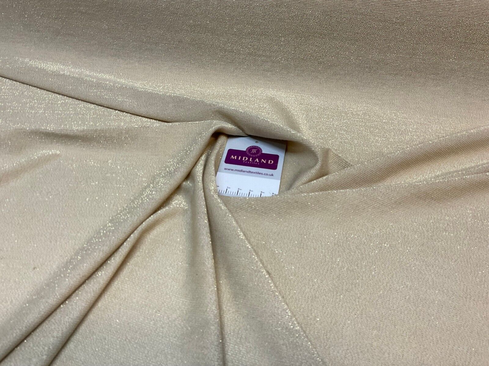 Gold Jersey Stretch Shimmer Metalic dress fabric M1783