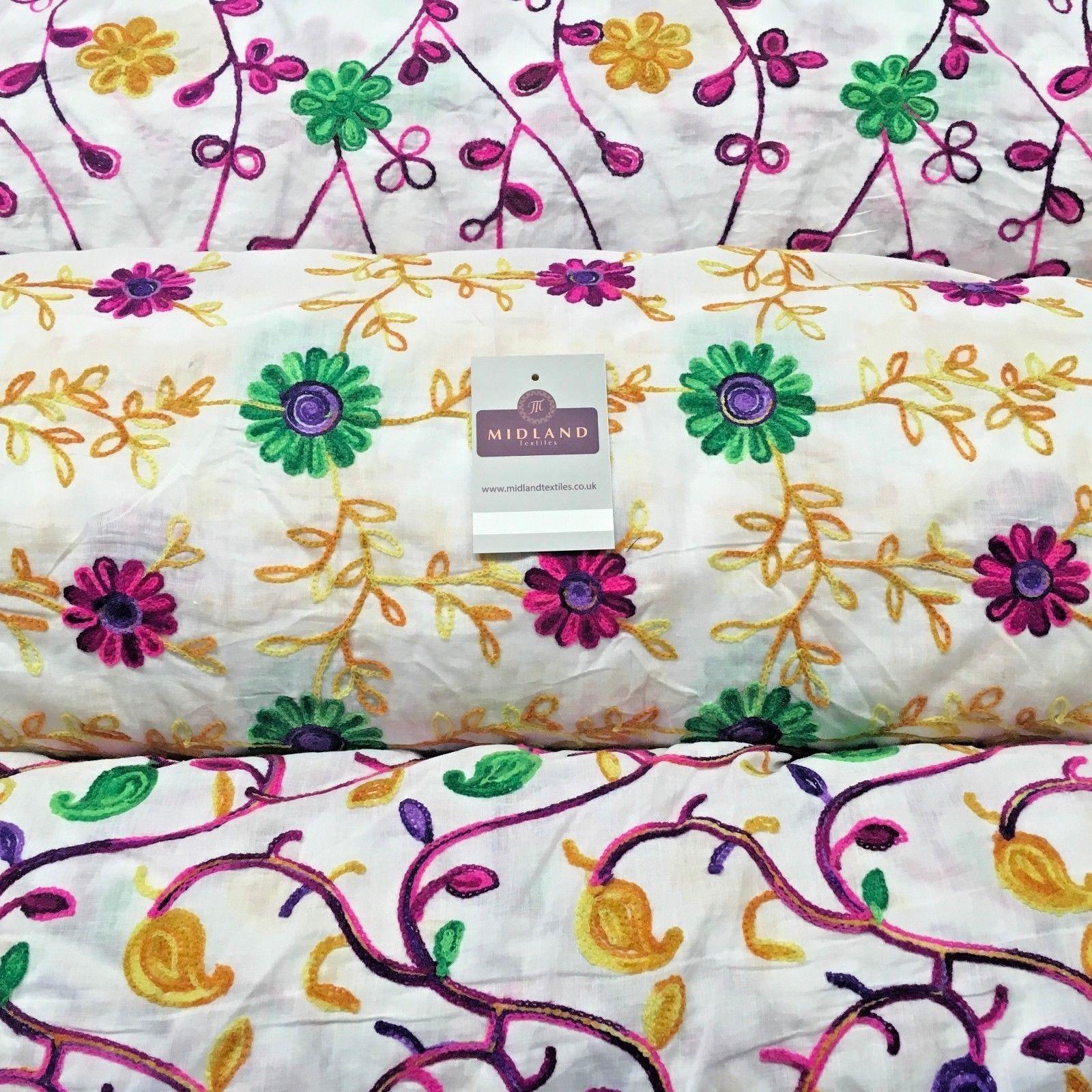 White Cotton with multicoloured wool embroidered dress fabric 54" Wide White Cotton with multicoloured wool embroidered dress fabric 54" Wide