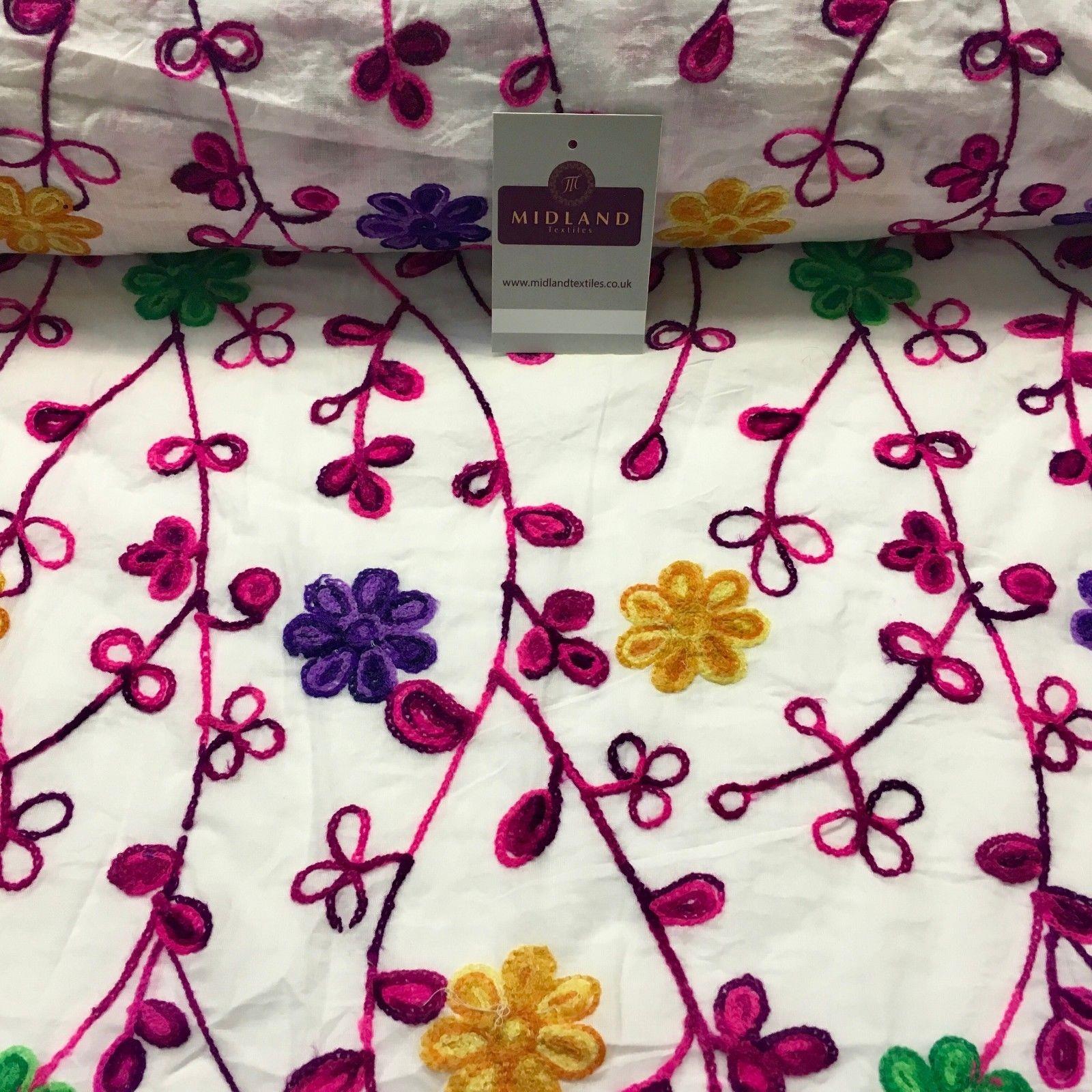 White Cotton with multicoloured wool embroidered dress fabric 54' Wide M1000