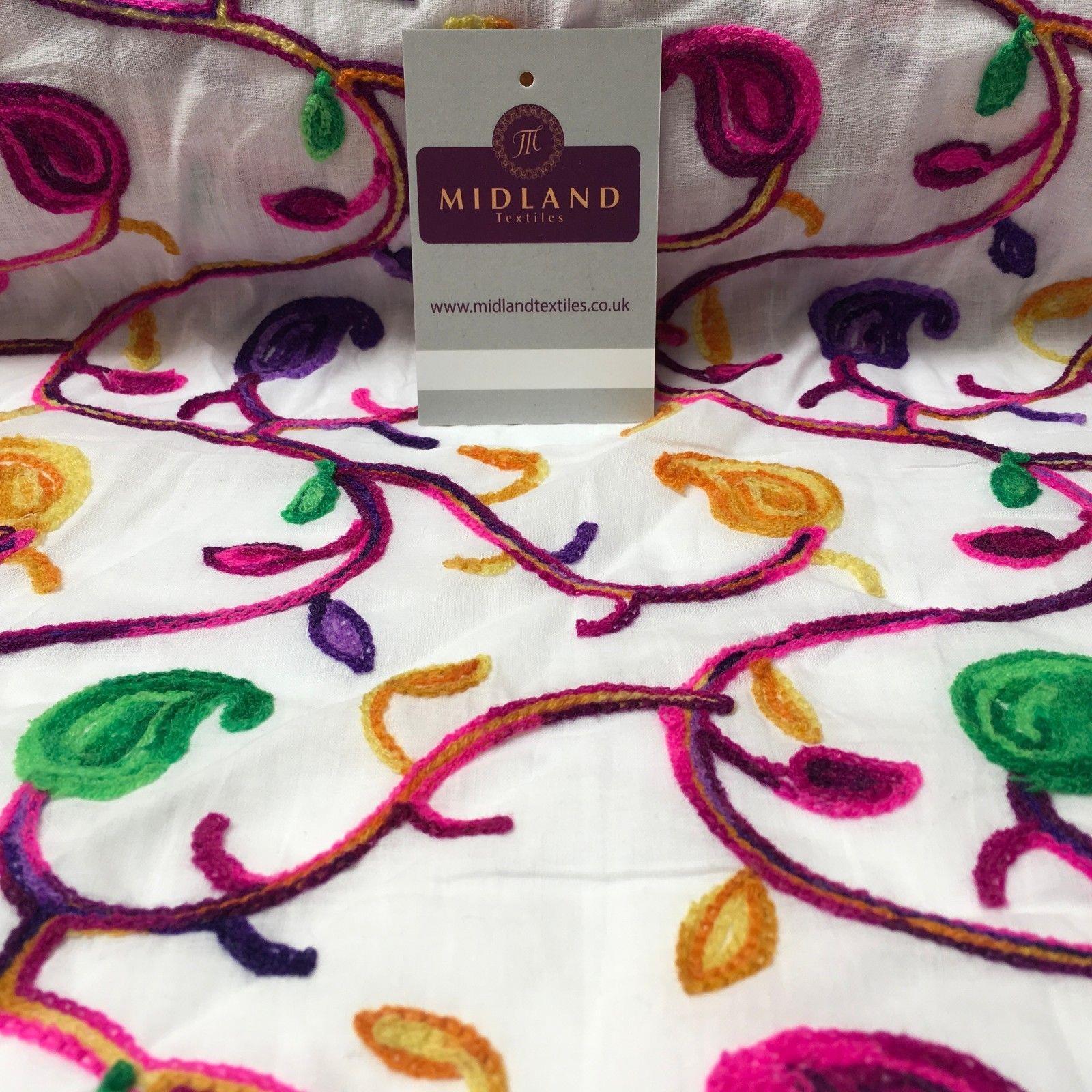 White Cotton with multicoloured wool embroidered dress fabric 54" Wide White Cotton with multicoloured wool embroidered dress fabric 54" Wide
